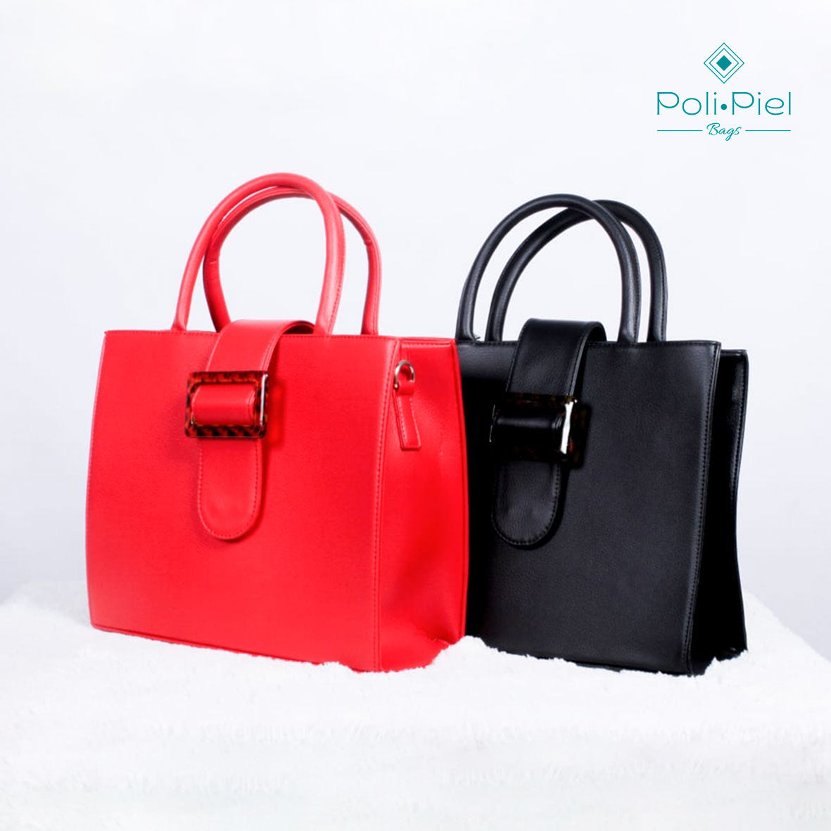 Gema: bolso estructurado en microfibra con doble manija y hebilla decorativa